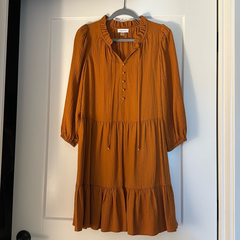 Calvin Klein dress. Never used. In perfect condition. Comfortable and elegant.